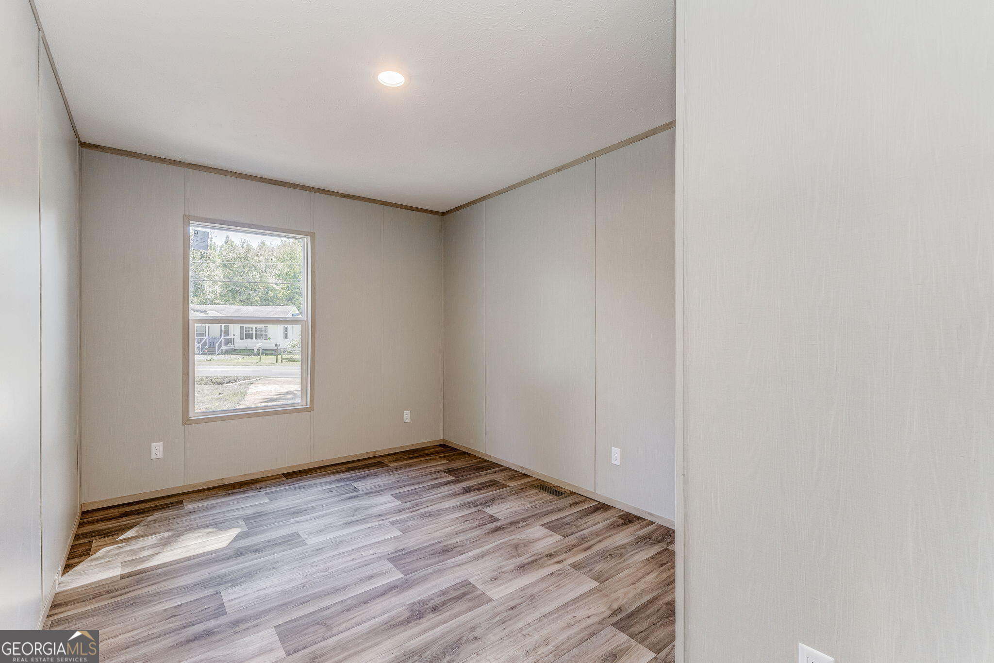 865 Old Rockmart Road Southeast Silver Creek, GA 30173 - Photo 39 of 52 an empty room with wooden floor and window