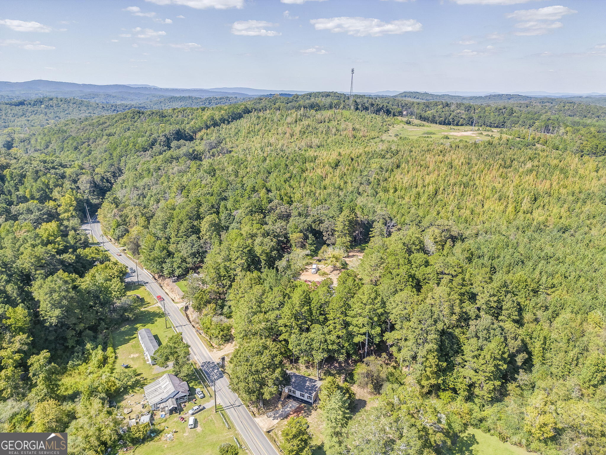 865 Old Rockmart Road Southeast Silver Creek, GA 30173 - Photo 4 of 52 a view of a large yard with an outdoor space