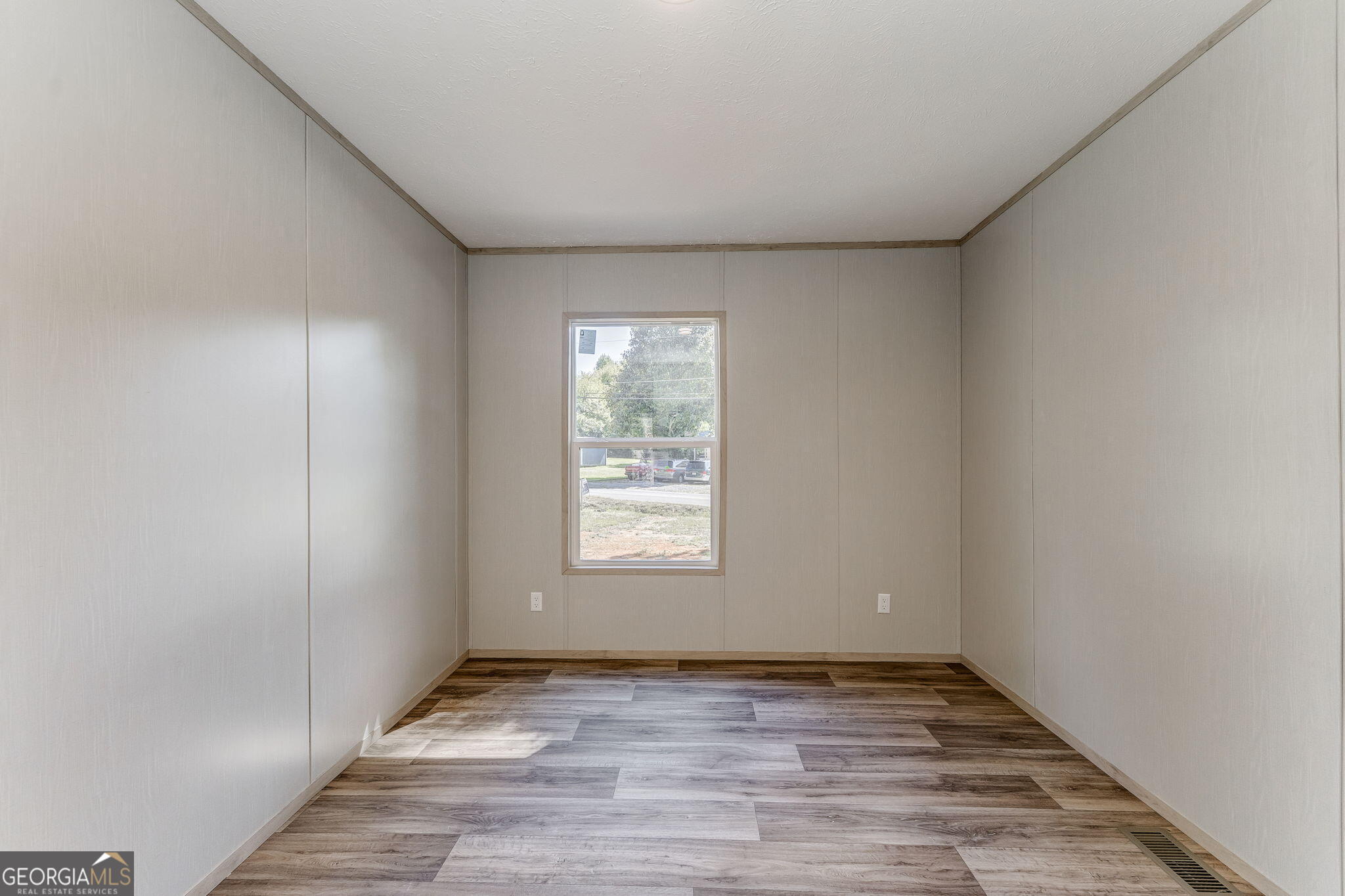 865 Old Rockmart Road Southeast Silver Creek, GA 30173 - Photo 41 of 52 a view of an empty room with wooden floor and window