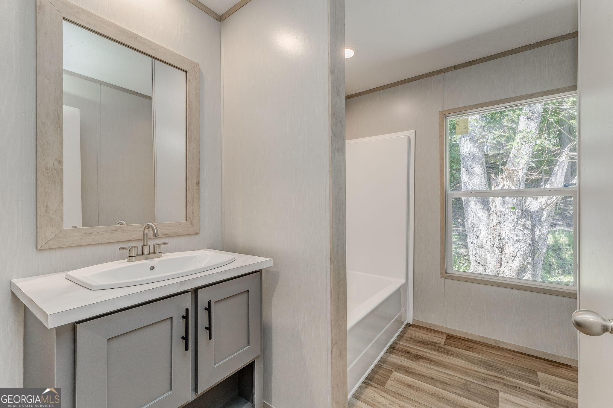 865 Old Rockmart Road Southeast Silver Creek, GA 30173 - Photo 42 of 52 a bathroom with a sink and a mirror