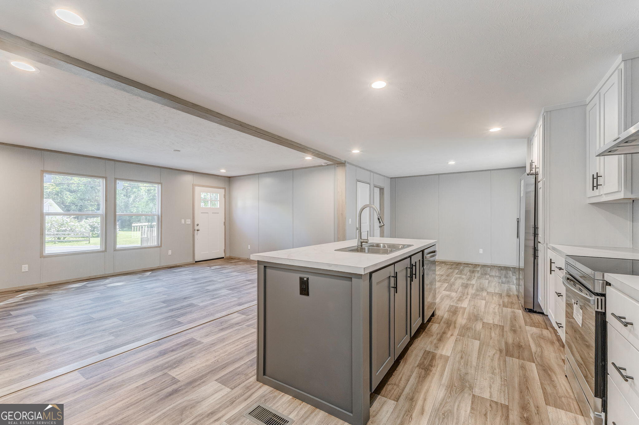 865 Old Rockmart Road Southeast Silver Creek, GA 30173 - Photo 48 of 52 a kitchen with a sink and wooden floor