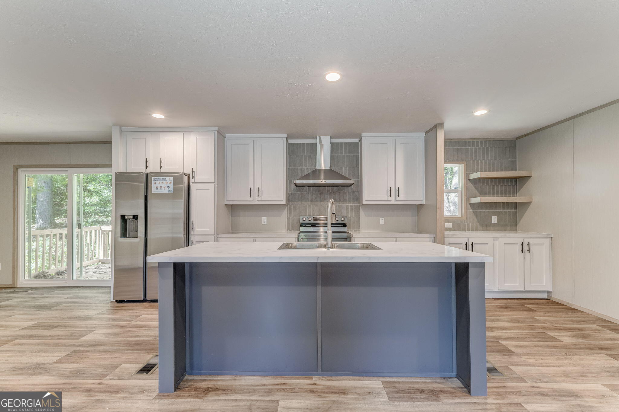 865 Old Rockmart Road Southeast Silver Creek, GA 30173 - Photo 5 of 52 a kitchen with stainless steel appliances granite countertop a sink stove and refrigerator