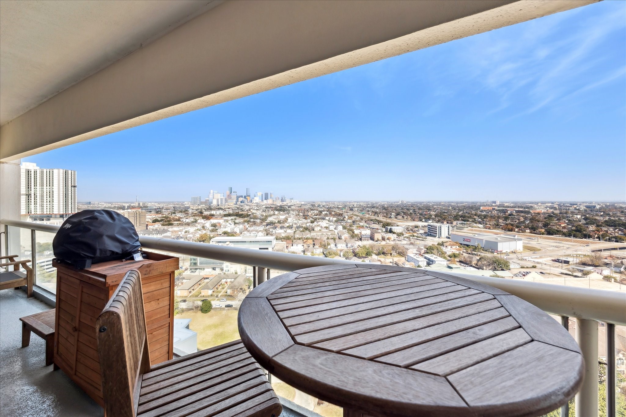 1701 Hermann Drive, Unit 22CE Houston, TX 77004 - Photo 21 of 37 a view of a balcony with furniture