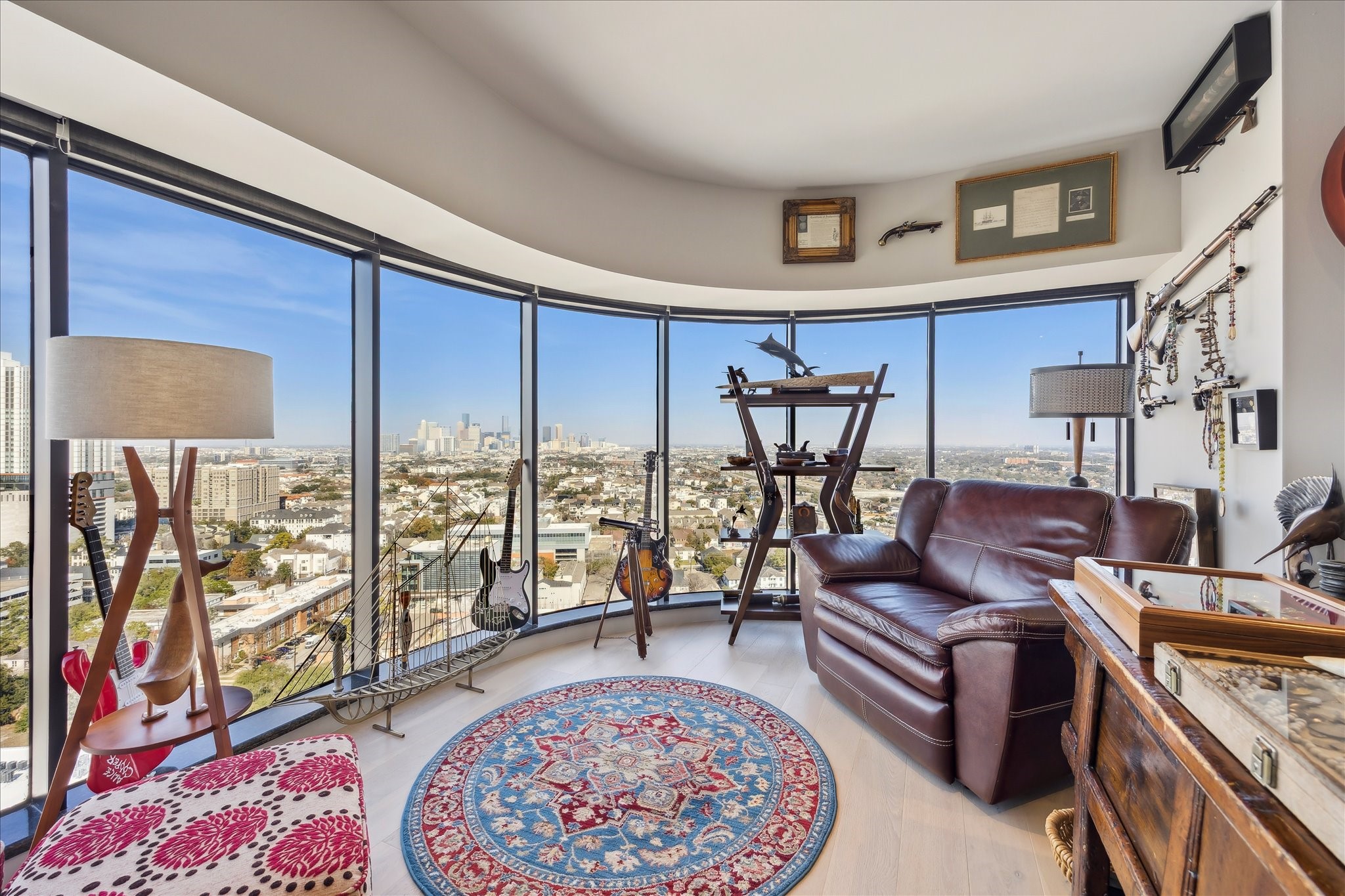 1701 Hermann Drive, Unit 22CE Houston, TX 77004 - Photo 3 of 37 a living room with furniture