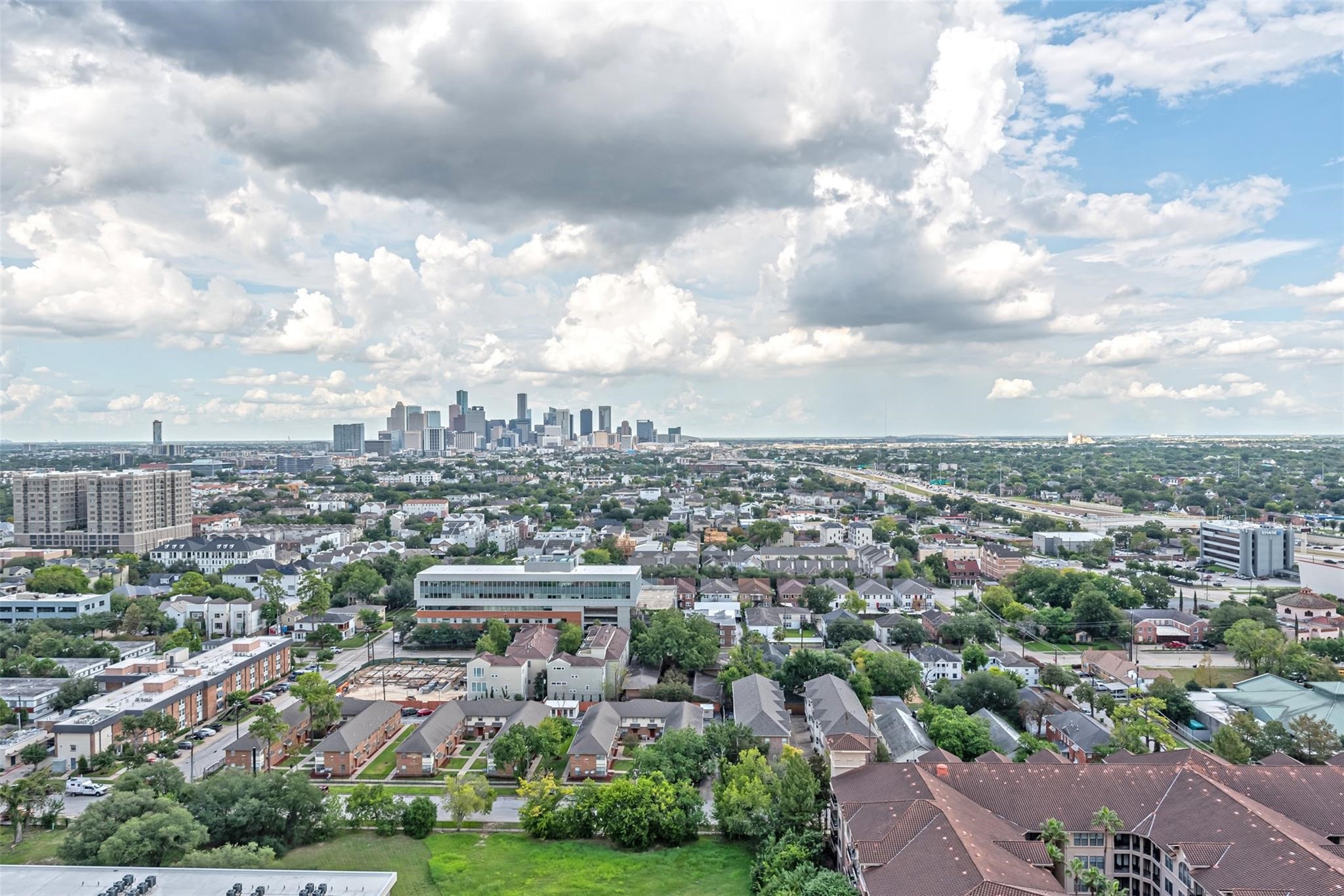 1701 Hermann Drive, Unit 22CE Houston, TX 77004 - Photo 4 of 37 a view of a city with lot of buildings