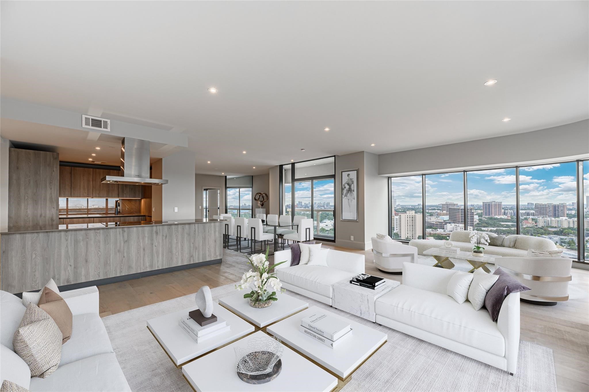 1701 Hermann Drive, Unit 22CE Houston, TX 77004 - Photo 5 of 37 a living room with furniture and a view of kitchen