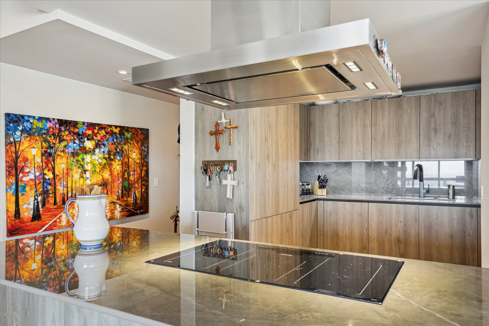1701 Hermann Drive, Unit 22CE Houston, TX 77004 - Photo 6 of 37 a kitchen with a sink and a counter top space