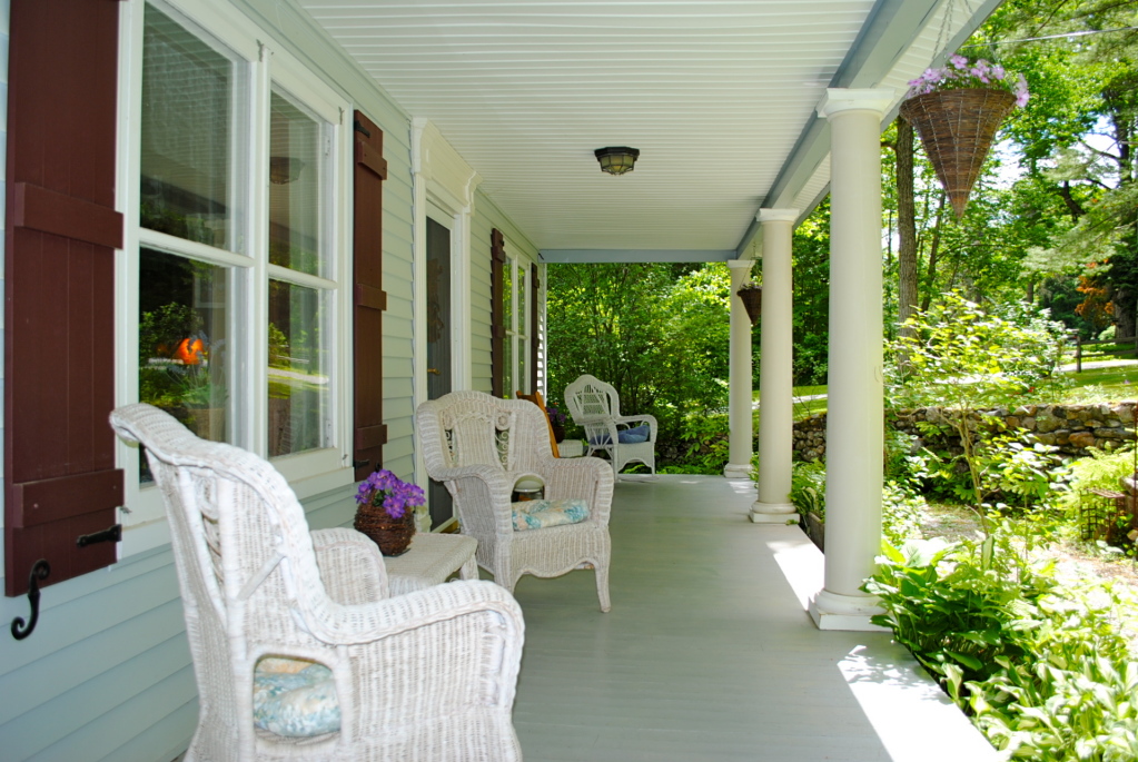 559 Main Road Monterey, MA 01245 - Photo 22 of 32 a view of balcony with furniture and garden