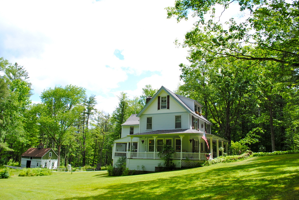 559 Main Road Monterey, MA 01245 - Photo 8 of 32 a view of a house with a big yard