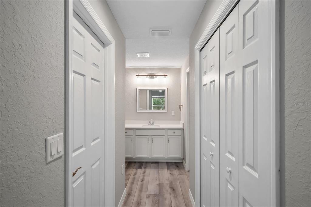 7052 Southwest 179th Ave Road Dunnellon, FL 34432 - Photo 29 of 42 a bathroom with a sink and a mirror