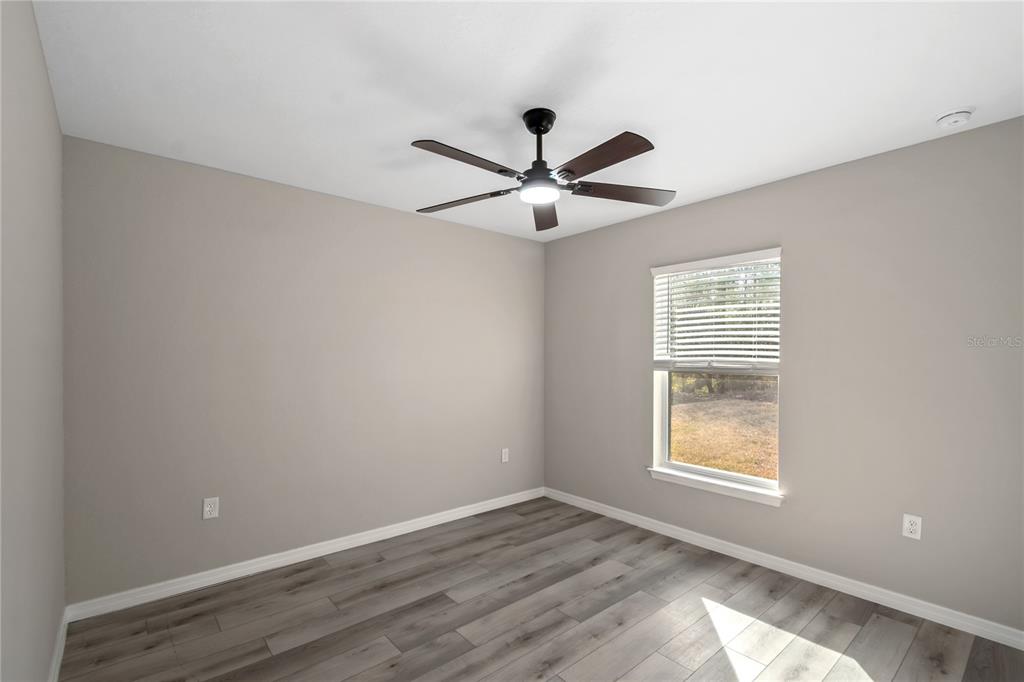 7052 Southwest 179th Ave Road Dunnellon, FL 34432 - Photo 32 of 42 a view of an empty room with a window