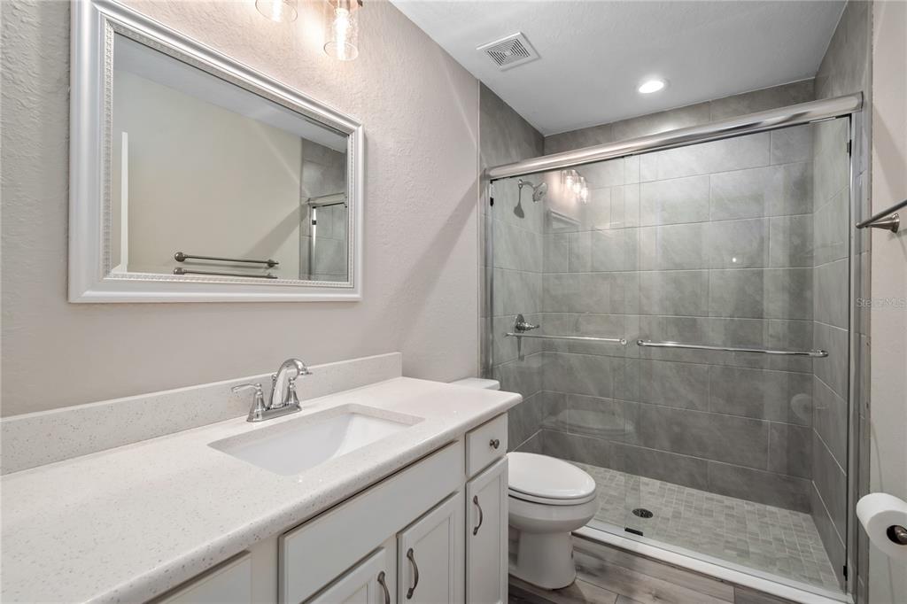 7052 Southwest 179th Ave Road Dunnellon, FL 34432 - Photo 34 of 42 a bathroom with a sink toilet and shower