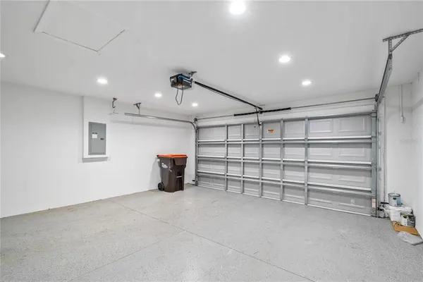 a view of an empty room with storage and utility
