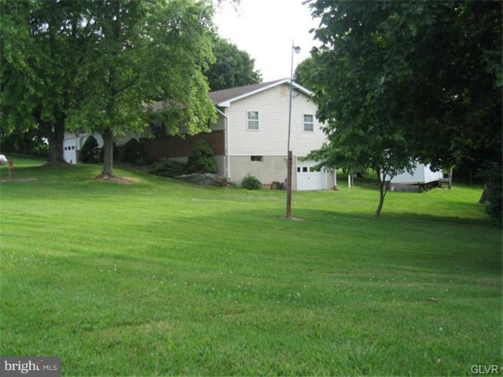 160 Kemmerer Road Nazareth, PA 18064 - Photo 3 of 14 a view of a house with a backyard