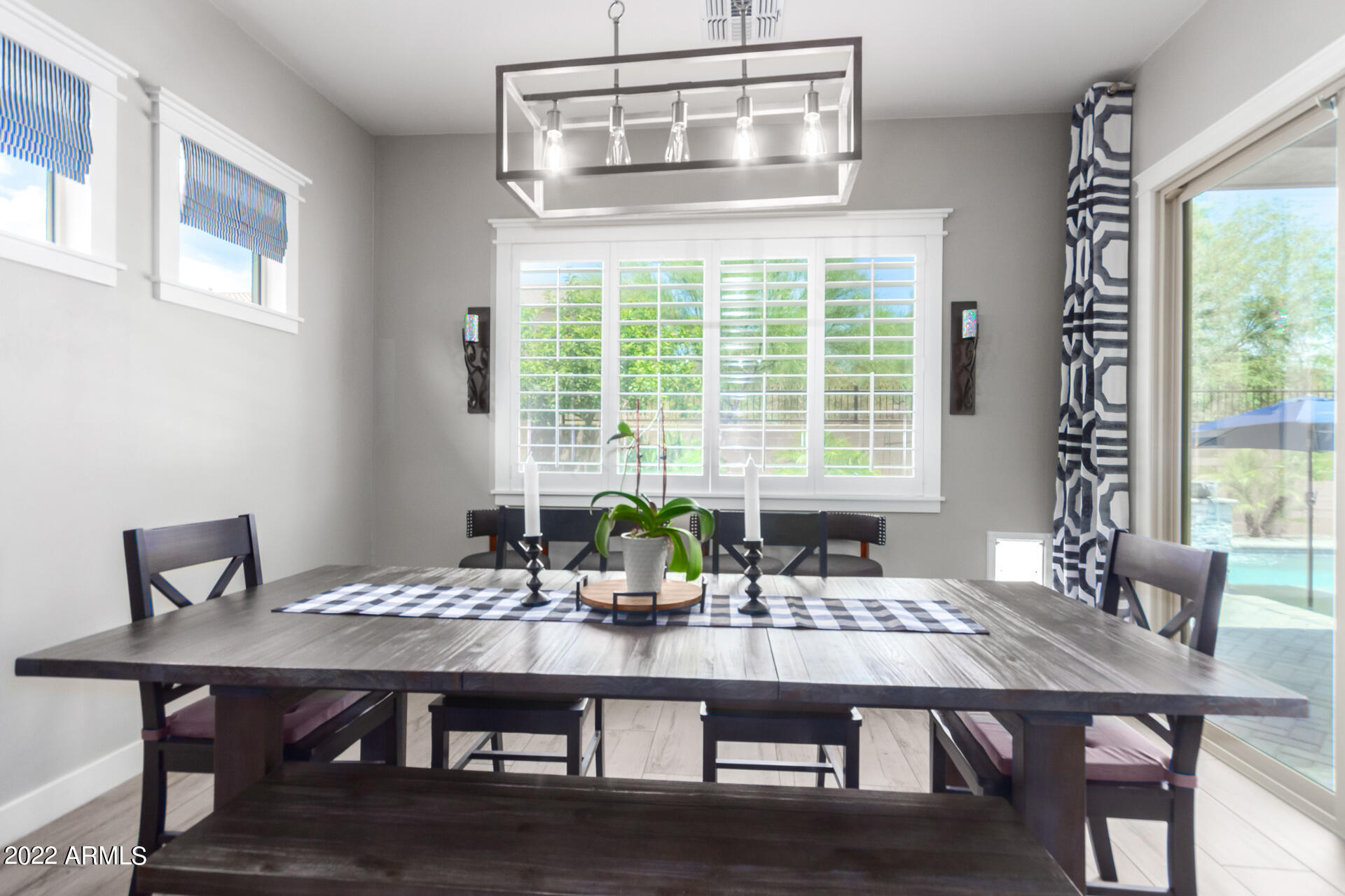 28001 92nd Avenue Peoria, AZ 85383 - Photo 18 of 45 a view of a dining room with furniture and window