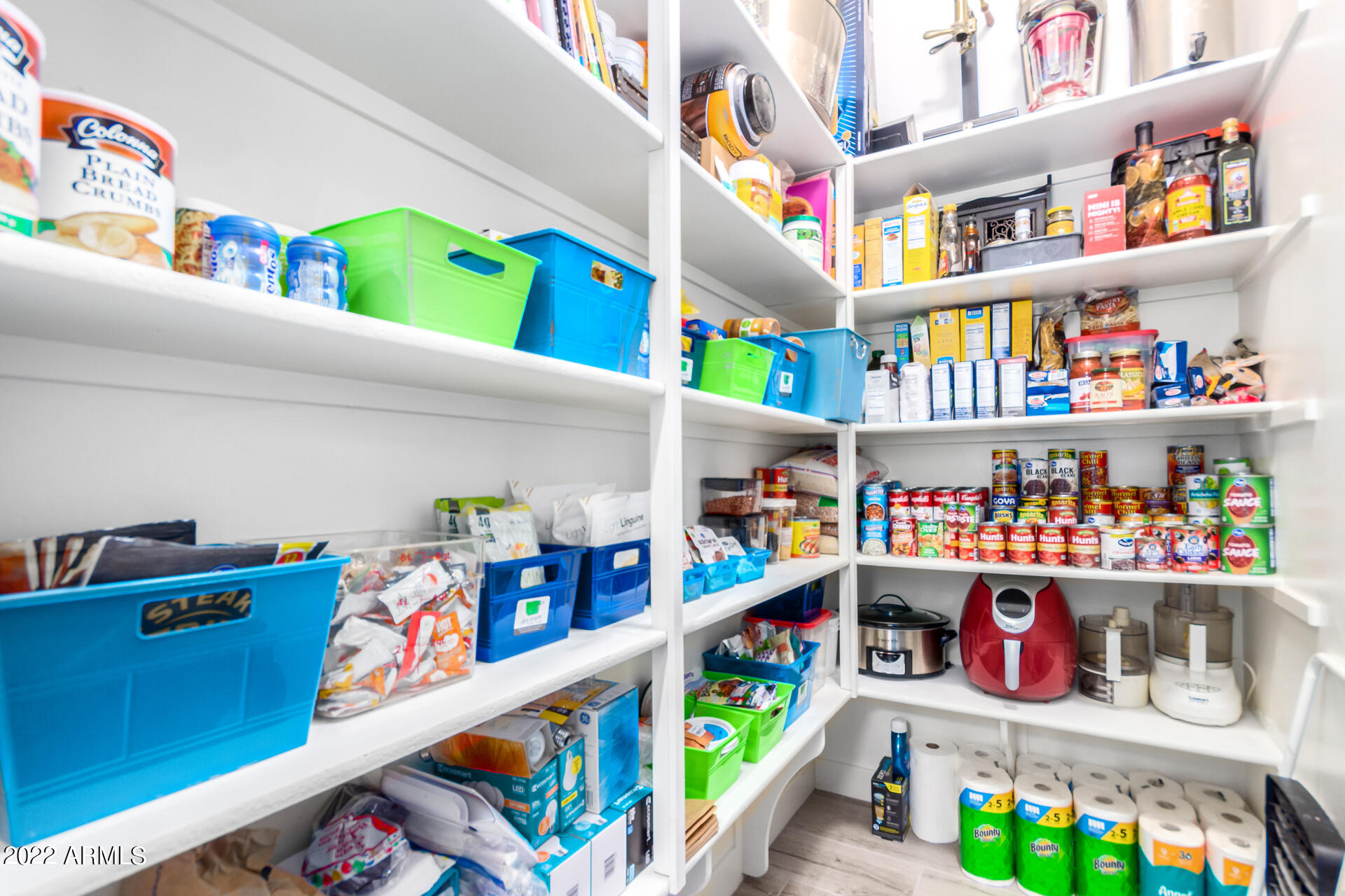 28001 92nd Avenue Peoria, AZ 85383 - Photo 19 of 45 a room with furniture and a book shelf