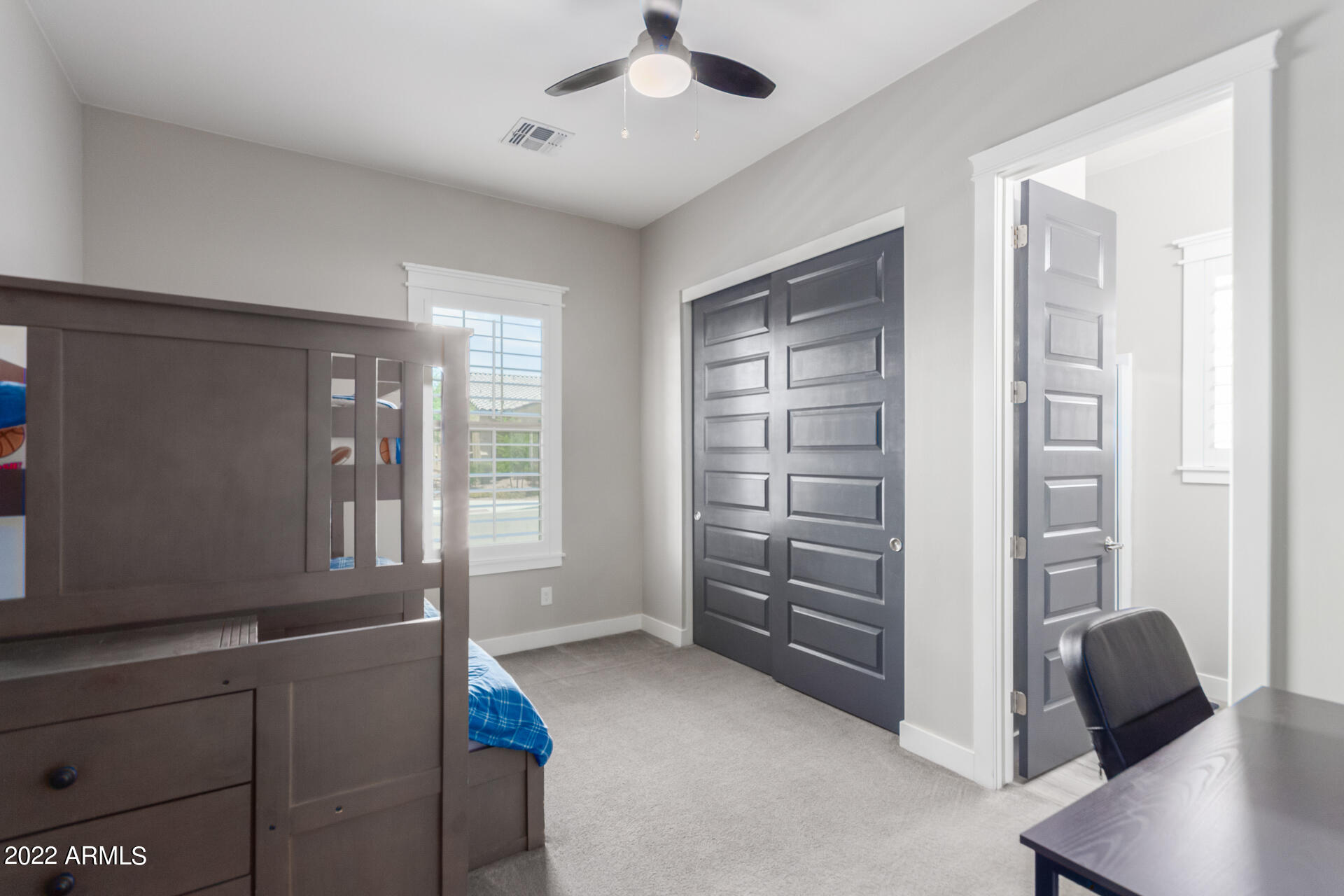 28001 92nd Avenue Peoria, AZ 85383 - Photo 27 of 45 a view of an empty room with a window and a kitchen