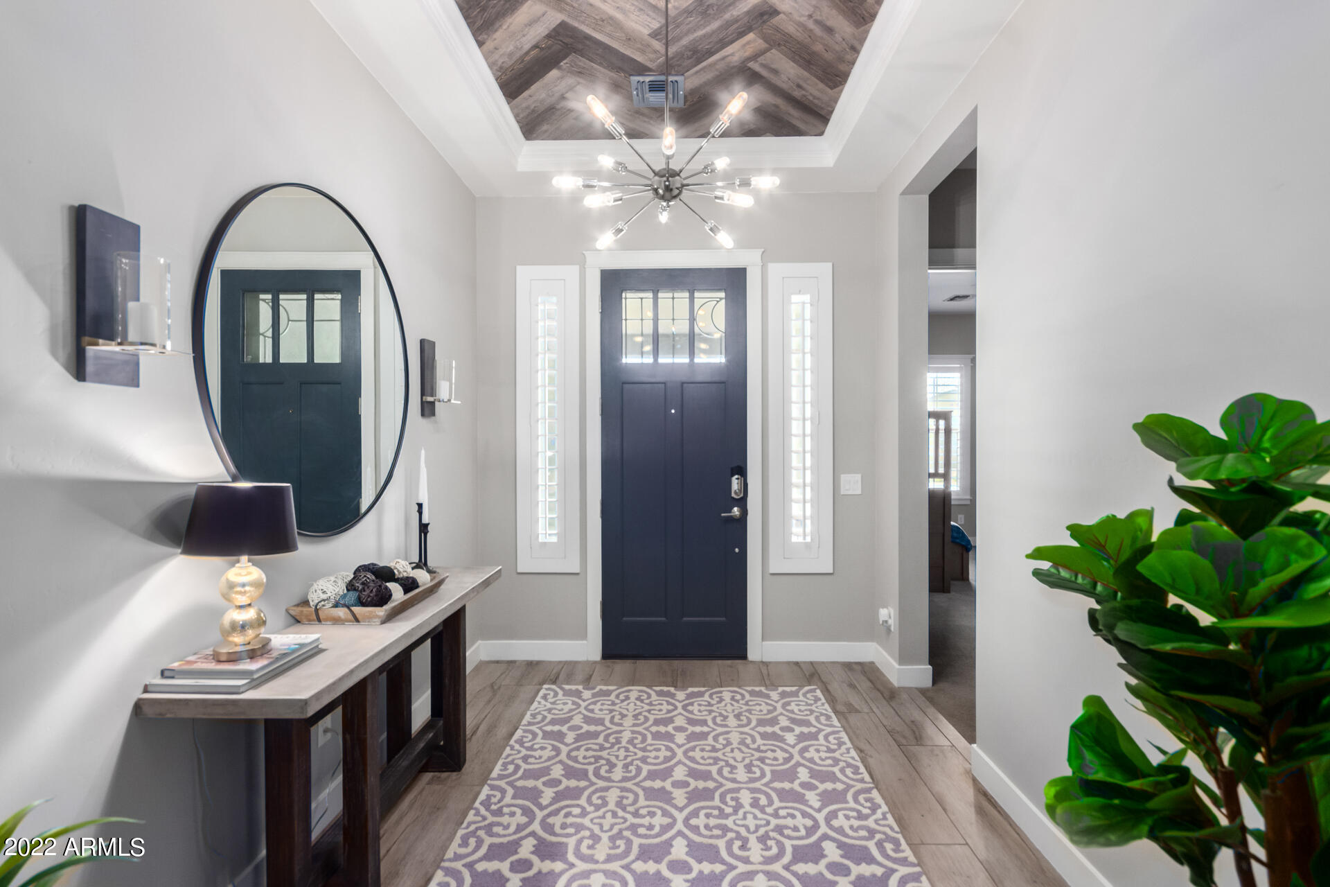 28001 92nd Avenue Peoria, AZ 85383 - Photo 4 of 45 a view of an entryway with a potted plant