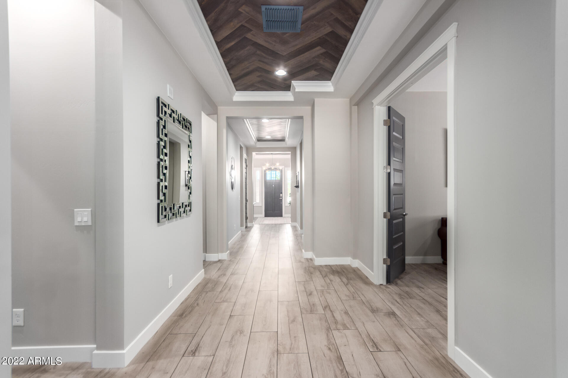 28001 92nd Avenue Peoria, AZ 85383 - Photo 5 of 45 a view of hallway with wooden floor