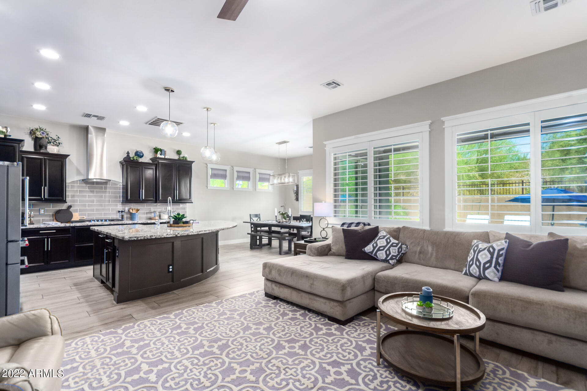 28001 92nd Avenue Peoria, AZ 85383 - Photo 10 of 45 a living room with furniture and a large window