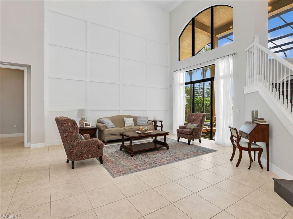 2756 Crystal Way Naples, FL 34119 - Photo 9 of 50 a living room with furniture and a window