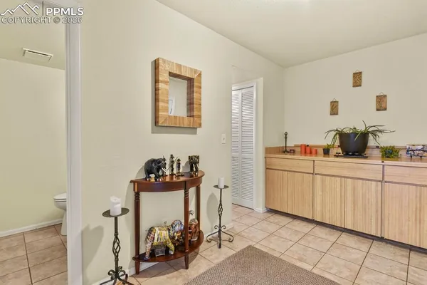 a room with a sink and cabinets