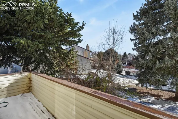 a view of a yard with a bench