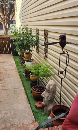 a view of a backyard with sitting area