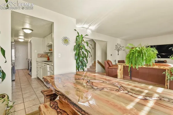 a view of a living room and dining room