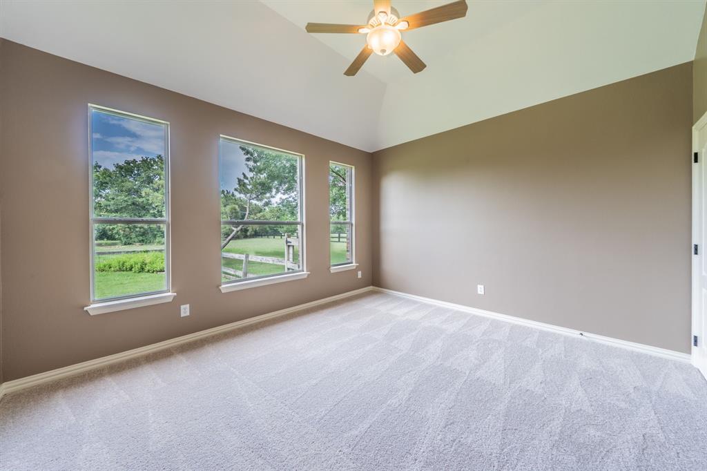 7517 Rodeo Drive Denton, TX 76208 - Photo 20 of 39 This flex room off the breakfast room could be a bedroom, office, exercise room, or studio - fresh carpet as of May 2026.