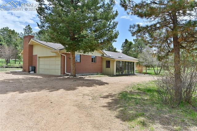 15445 Raton Road Colorado Springs, CO 80921 - Photo 36 of 46 Plenty of parking for RV, and attached 2-car garage.