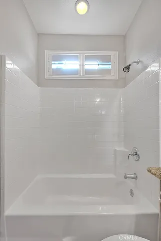 a view of a livingroom with wooden floor