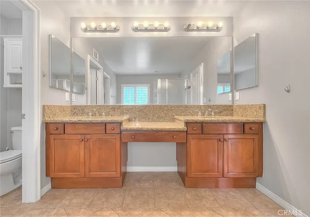 a living room with a fireplace and a window