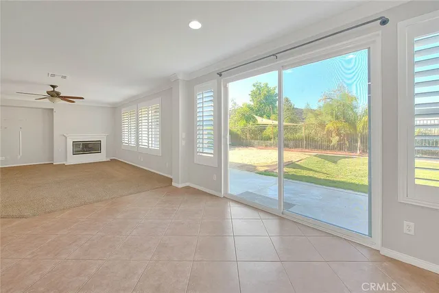 a view of cabinets a sink and a stove in a room