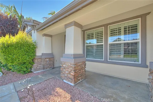 a view of front door of house with outdoor space