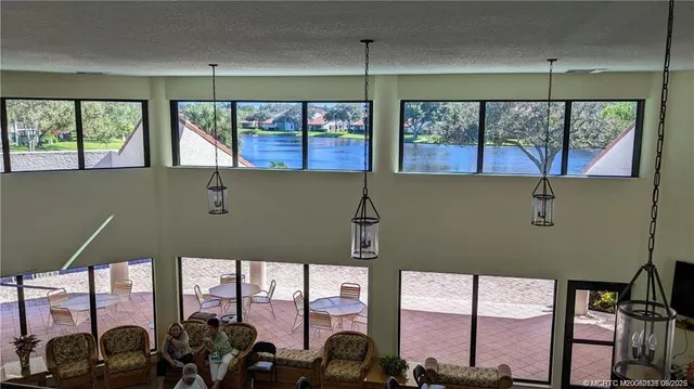 a front view of a building with garden