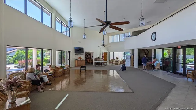 a view of a livingroom with furniture window and outside view
