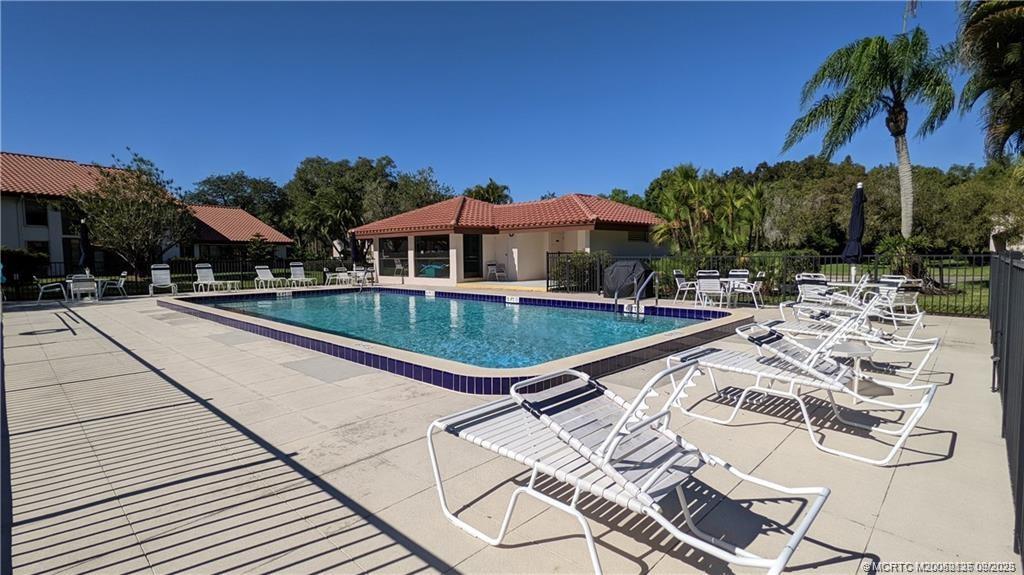Undisclosed Address Stuart, FL 34997 - Photo 36 of 51 a view of a patio with swimming pool