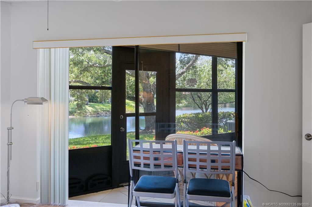 Undisclosed Address Stuart, FL 34997 - Photo 49 of 51 a room with furniture and a large window