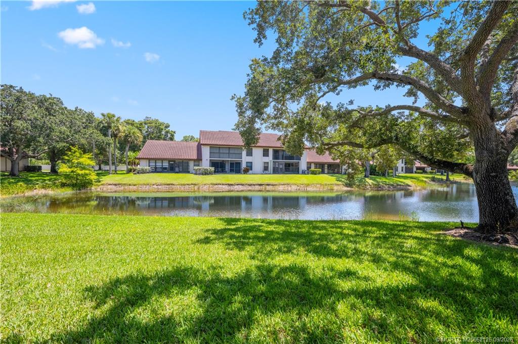 Undisclosed Address Stuart, FL 34997 - Photo 50 of 51 a view of a lake with houses