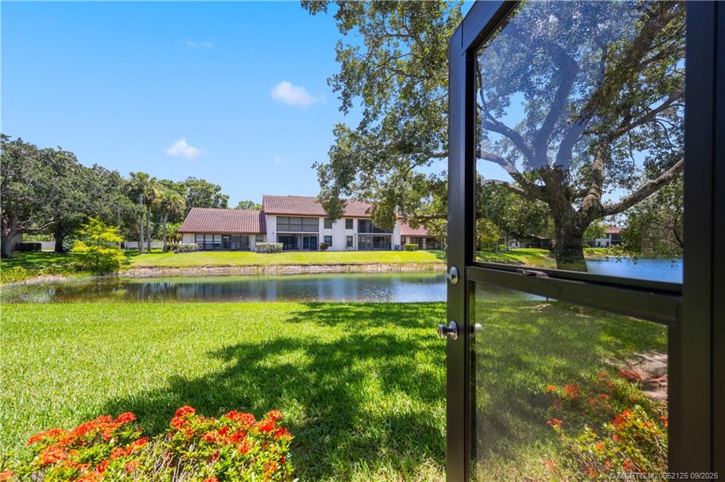 Undisclosed Address Stuart, FL 34997 - Photo 51 of 51 a swimming pool with trees in the background