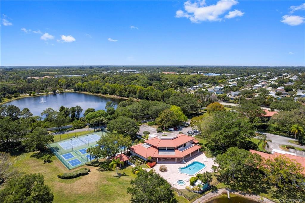 Undisclosed Address Stuart, FL 34997 - Photo 8 of 51 an aerial view of a house with a lake view