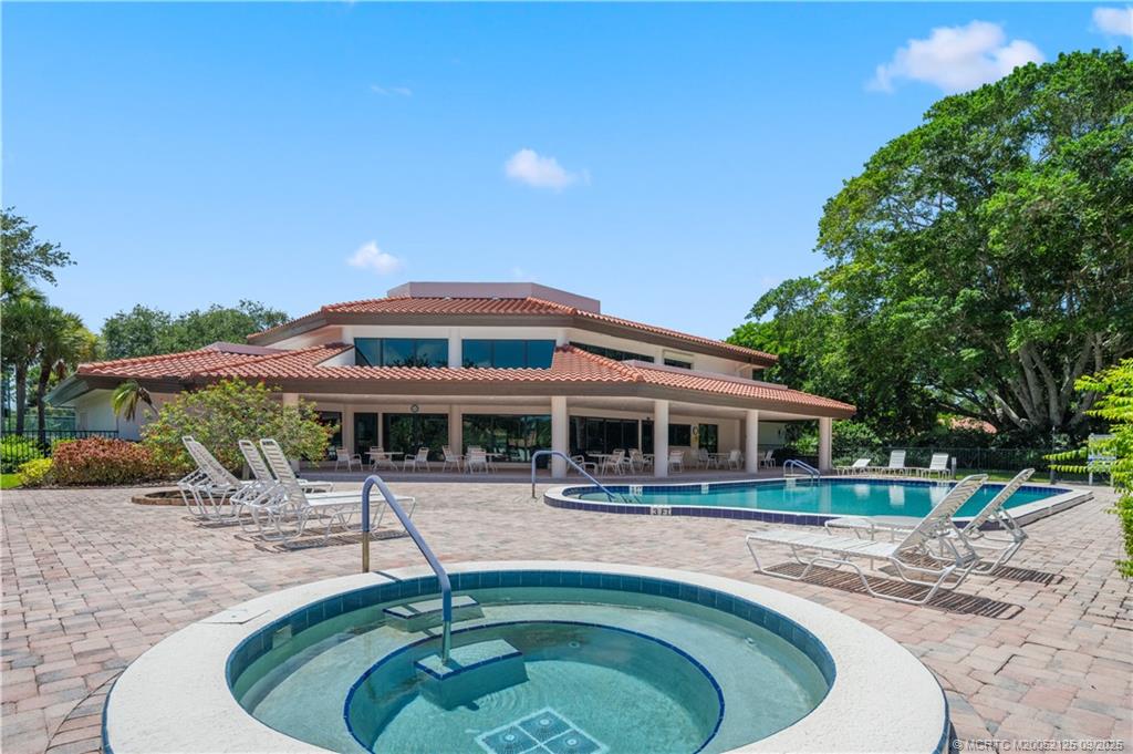 Undisclosed Address Stuart, FL 34997 - Photo 10 of 51 a swimming pool with outdoor seating and yard