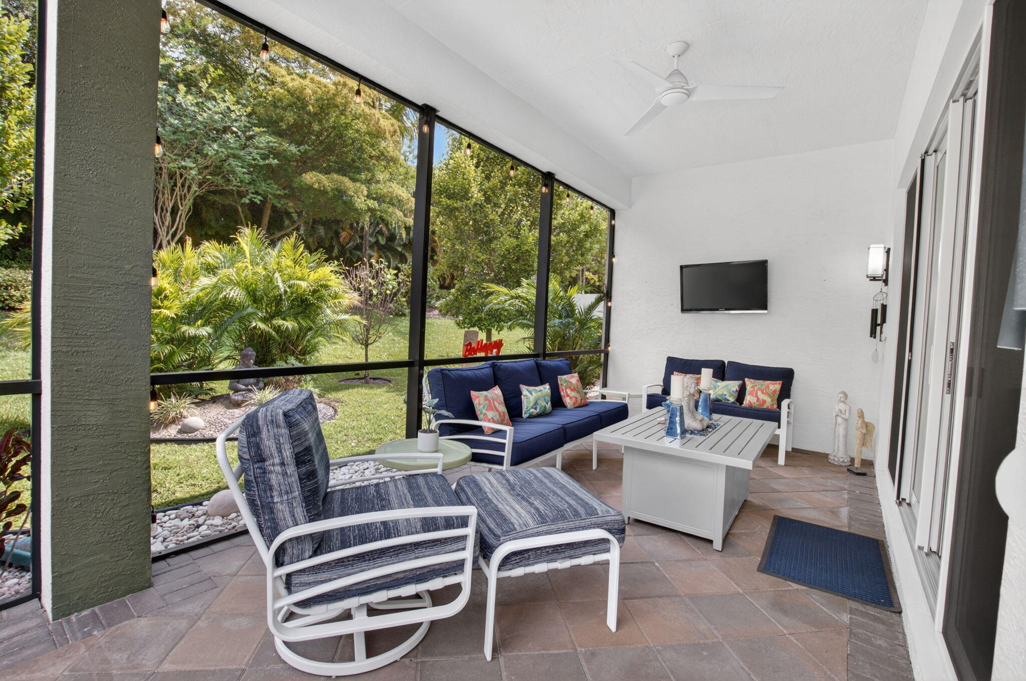 8263 Arabian Range Road Boynton Beach, FL 33473 - Photo 49 of 52 a balcony with furniture and a floor to ceiling window