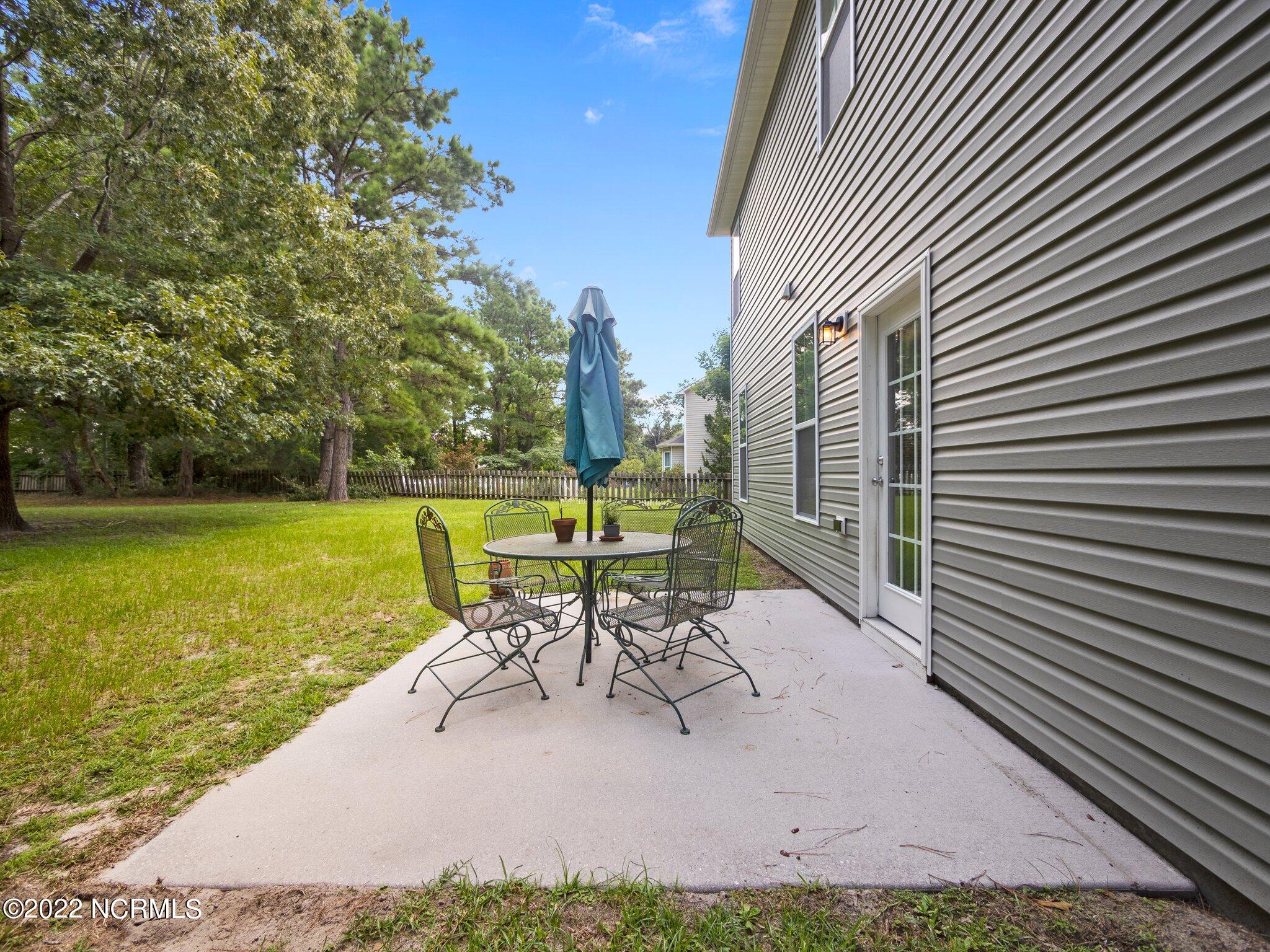 137 Roughleaf Trail Hampstead, NC 28443 - Photo 15 of 40 Back Patio