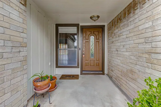 a front view of a house with outdoor seating