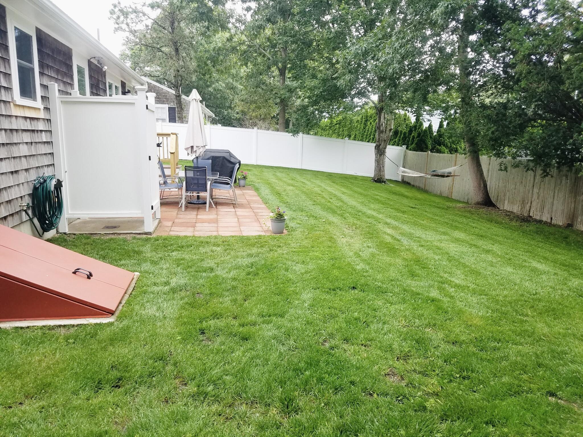 102 Lawrence Road Dennis Port, MA 02639 - Photo 4 of 28 Back yard