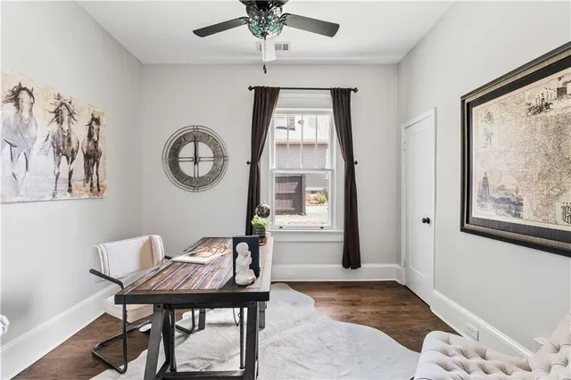 a view of a livingroom with furniture and window