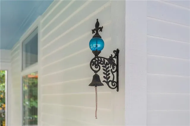 a vase of flowers sitting on a floor