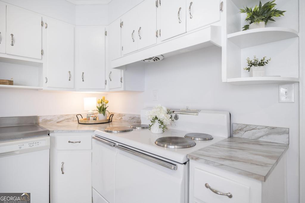 433 Pinecrest Road Macon, GA 31204 - Photo 15 of 38 a kitchen with a sink cabinets and window